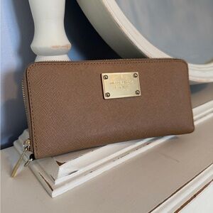 Michael Kors Tan Zip Around Wallet with Gold Plaque